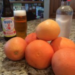 Getting prepped. Half dozen grapefruits and a Buoy Pilsner. Oh... and super cheap vodka that I don't even want to show the label.