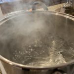 Making Hard Seltzer at Home / Dissolving corn sugar in boiling water