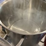 Making hard seltzer at home / Bringing water to a boil