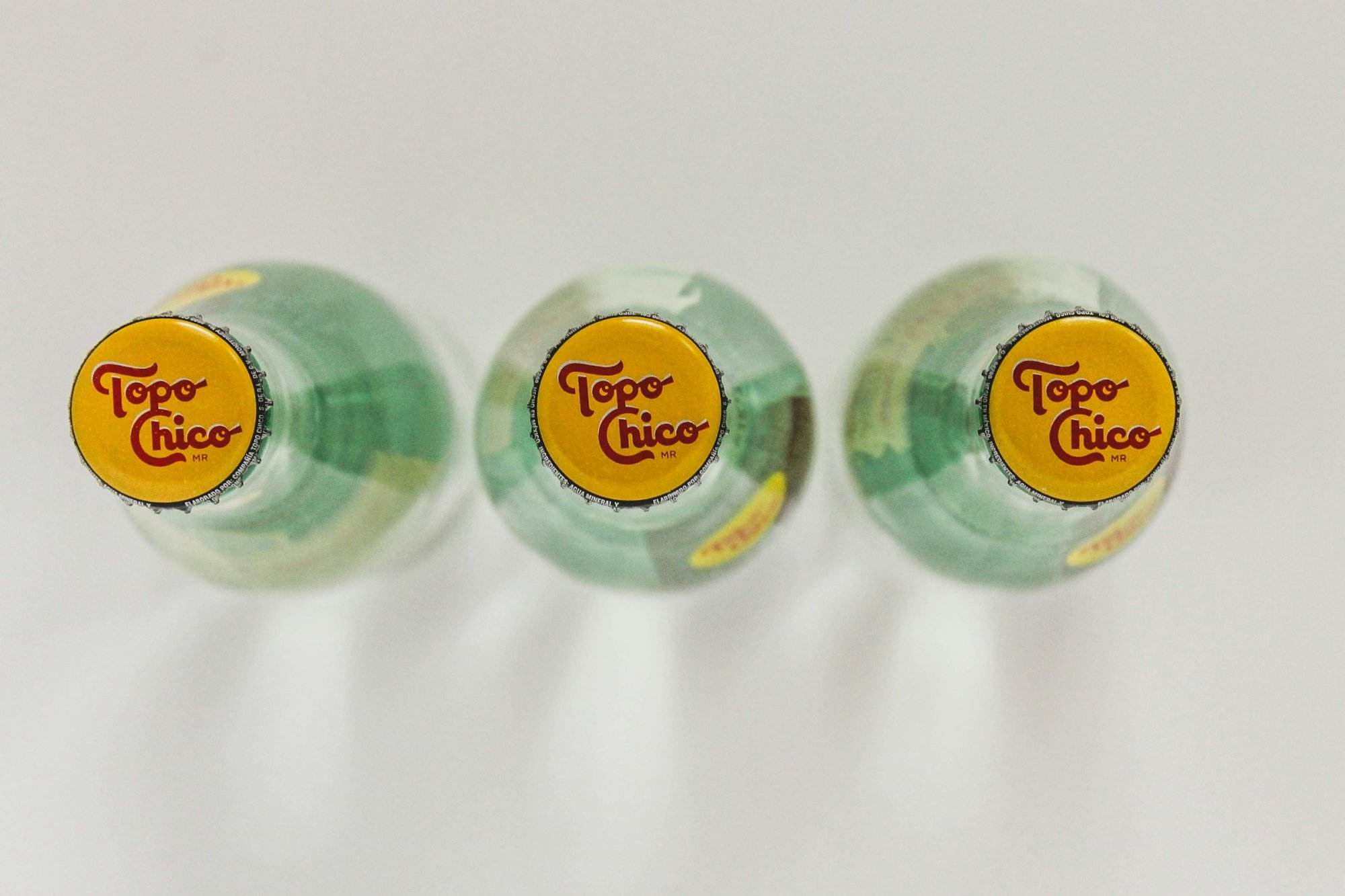 Topo Chico bottles signifying that we've got a Topo Chico clone recipe on our hands